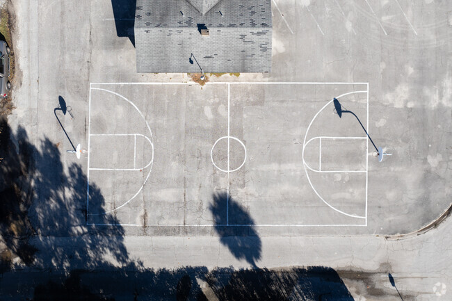Students at New Life Christian Academy enjoy playing basketball during gym class.