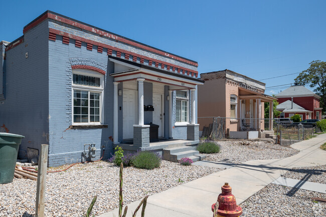 Row of flat roofed square homes in Ballpark.