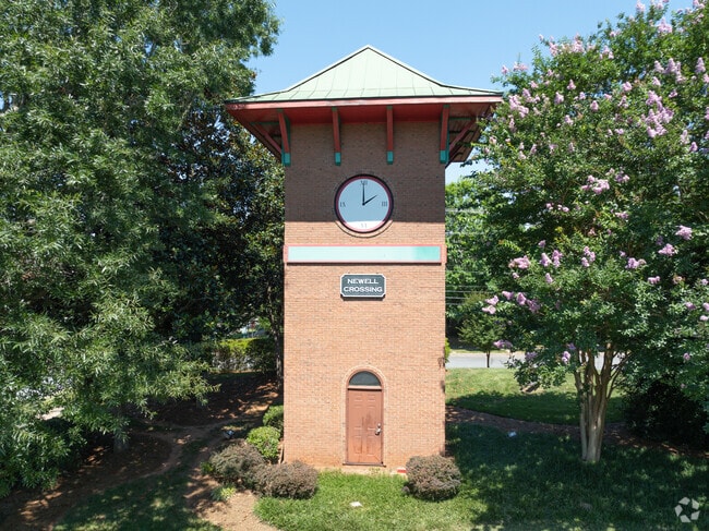 This clock tower shows the name of the neighborhood, Newell.
