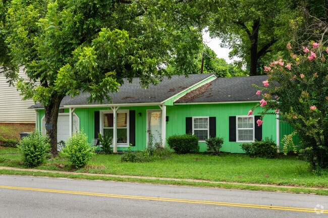 Brightly colored ranch homes sit on small plots of land in South Converse.
