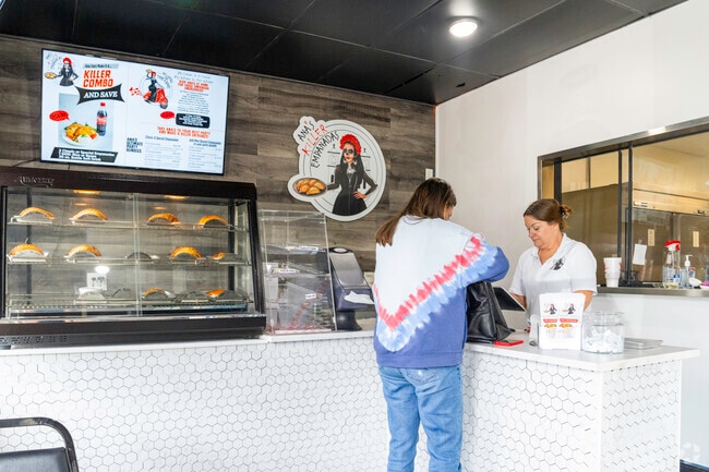 Indulge in the irresistible taste of Ana's killer empanadas near Hunters Run.