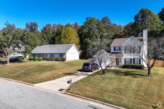 Homes in The Orchard feature a variety of styles and good-sized lawns.