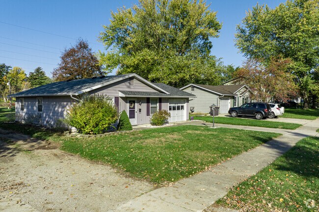 A stretch of bungalow homes nestled along the enchanting scenery of Sand Point in Fort Wayne.