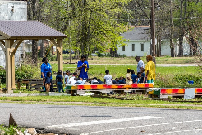 A class from Holy Family Elementary School visits the Community Garden.