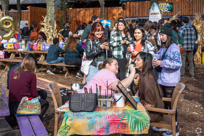 Get your face painted at Fall Fest on the Riverwalk in New East Side.