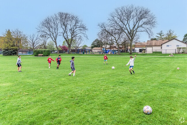 Kids run to the large fields after school to play soccer in Indian Head Park.