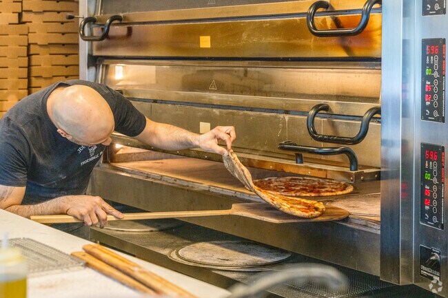 The pizza is well-known as top quality in Caln at Joey's Pizza.