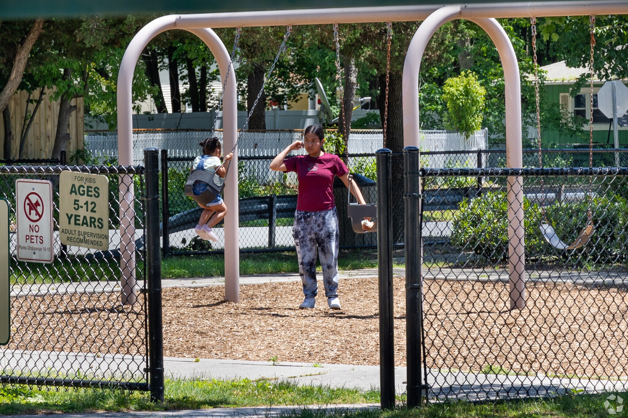 Bring your kids to the swing set at the Children's Park in Gordon Heights.