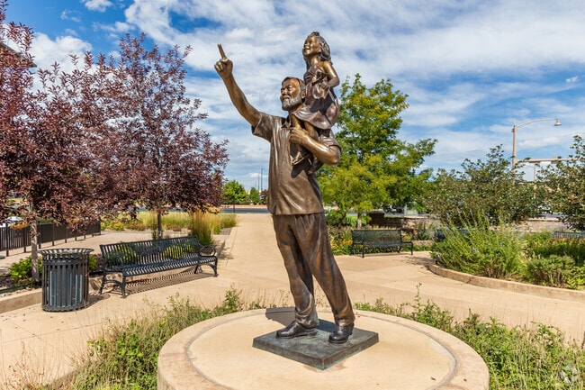 A local statue adds charm to Huntington Trails neighborhood.
