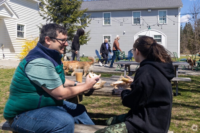 Local residents enjoy outdoor dining on a beautiful spring day in Cumberland Center.