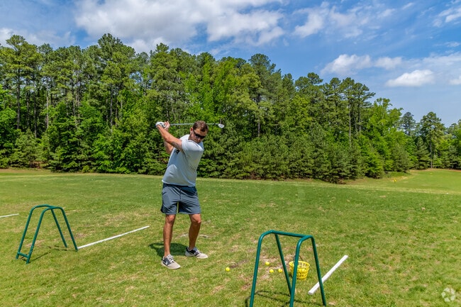 Improve your backswing on the driving range at Dogwoods Golf Course in Grenada.