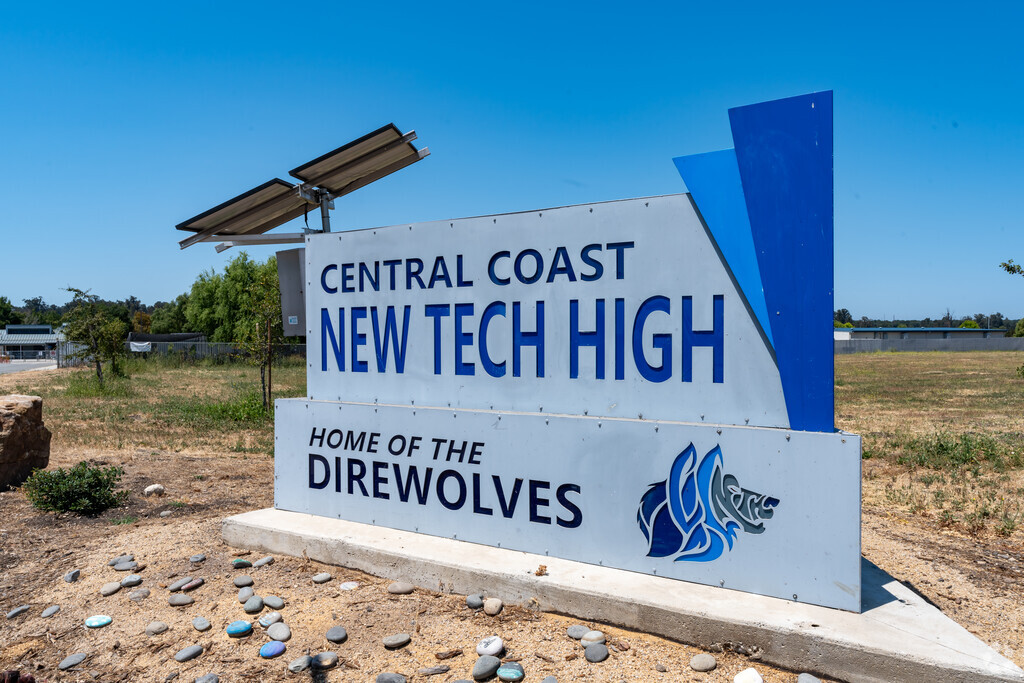 The sign at Central Coast New Tech High School welcomes students as they enter the campus.