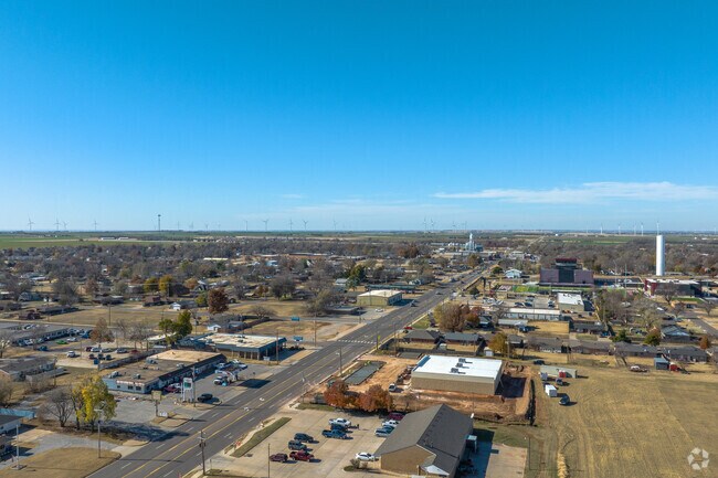 Tuttles Main St runs straight through the neighborhood connecting it to OKC.
