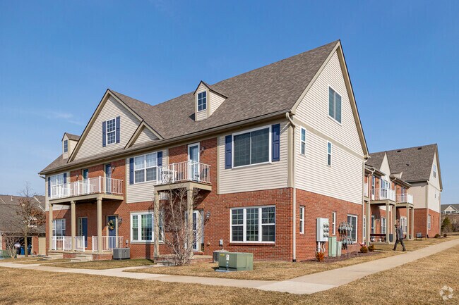 Three story brick condos in Bryant provide a great option for those looking for community.