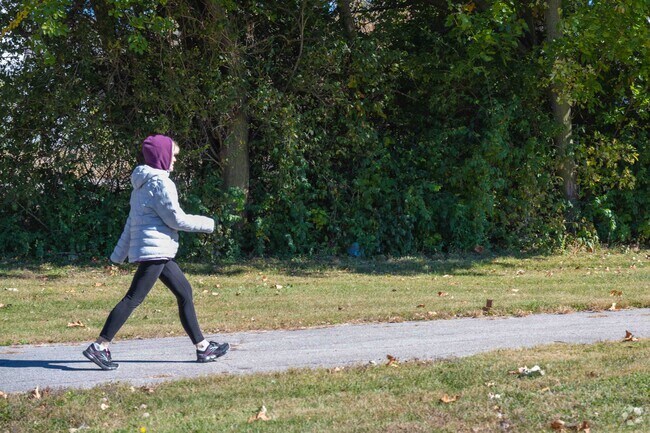 Hess Park near GM Square has a nice long walking trail  plus other amenities.