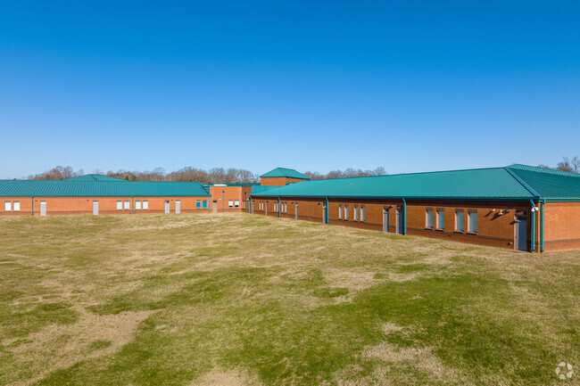 Marvin Wright Elementary School's classrooms open up to the playground area in Spring Hill.