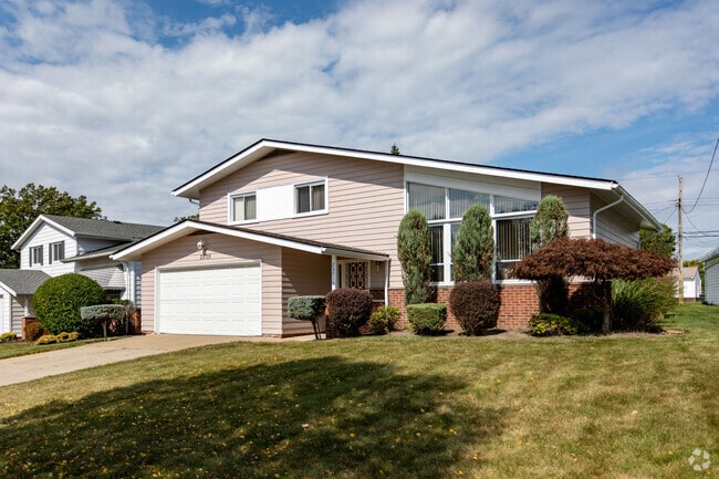 North Randall is home to houses with green grassy property lots.