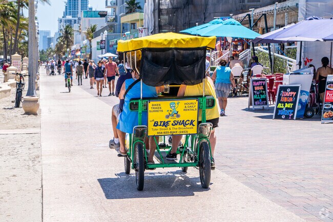 Pedaling along the scenic paths of Hollywood Beach, just a short ride from Hillcrest.