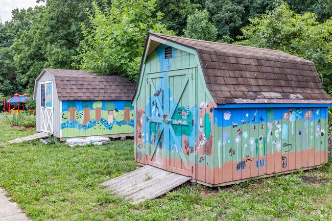 Colorfully painted storage sheds on Belvedere Elementary School's campus.