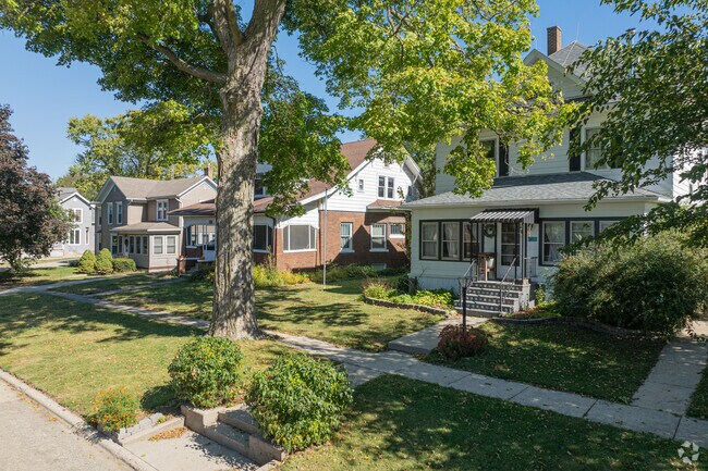 Ashton’s residential streets feature varied home styles with shaded lawns.