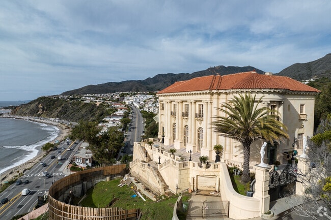 Villa de Leon overlooks the ocean from the cliffside.