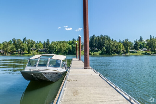 Boats dock at the Cedaroak Boat Ramp along the Willamette River in Robinwood.
