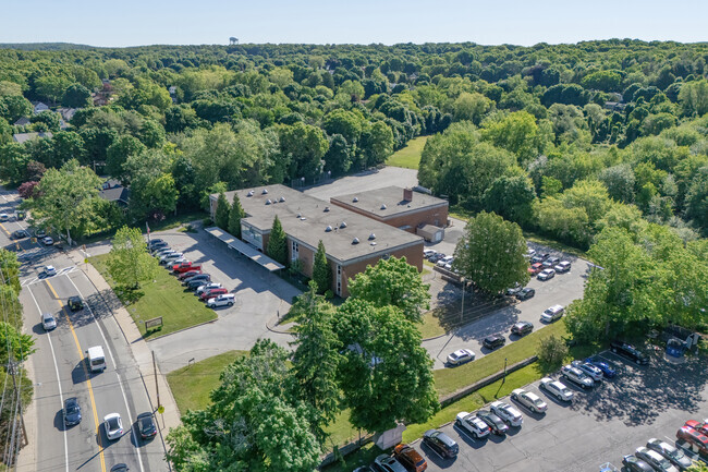 The Leo A. Savoie Elementary School is on the east side of Woonsocket and has a suburban site.
