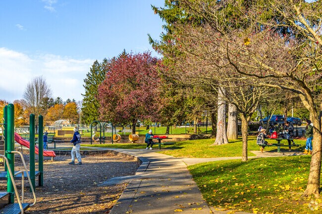 Families and friends gather at Mendham Park for hot coffee and light conversations.