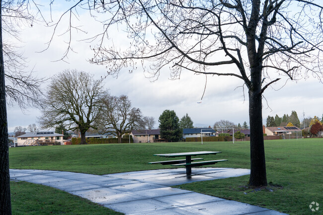 Several picnic benches can be enjoyed on the playground.