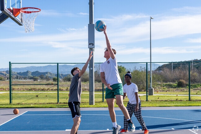 A player shoots a short hook shot during the game at Castaic Sports Complex in nearby Castaic.