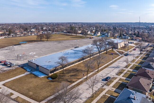 Whitman School is in the Honey Creek Manor neighborhood.