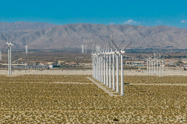 Windmill wonders under the vast desert skies of Desert Highland Gateway.