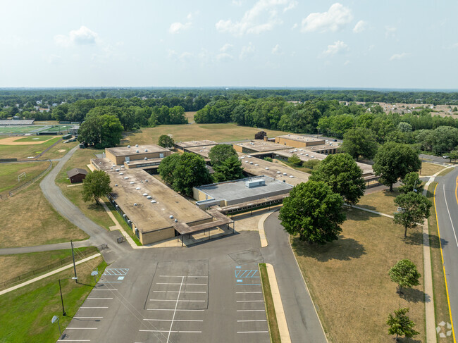 Emily C. Reynolds Middle School is surrounded by trees and nature.