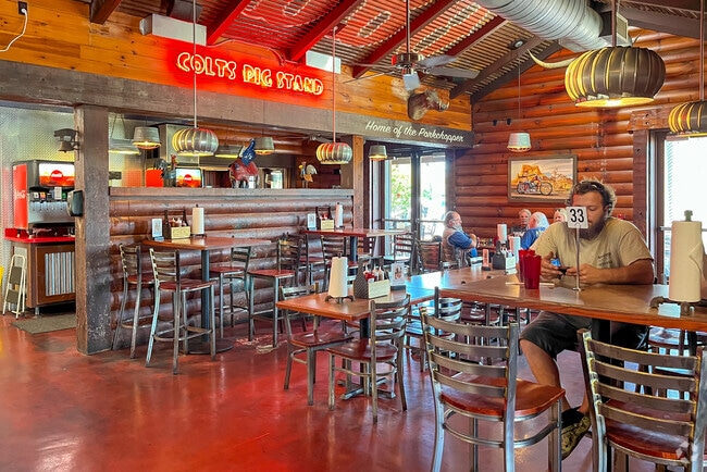 Get your BBQ on with the locals of Village Pine Run at Colt's Pig Stand.