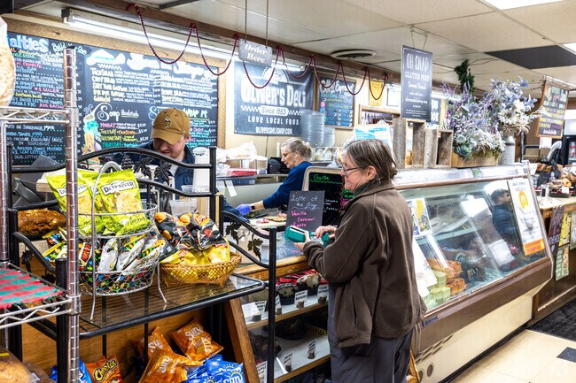 Enjoy some lunch at Oliver's Deli, it's next to the Oak Hills neighborhood.