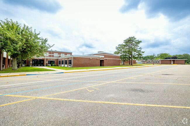 Coram Elementary School's goal is to maximize the students' social and academic potential.