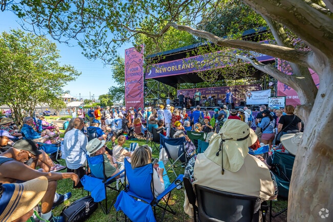 Catch a show in Jackson Square during the French Quarter Festival.