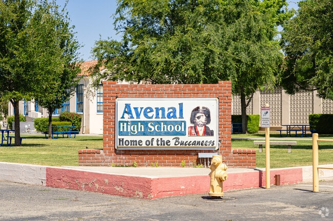 A large sign at the entrance to Avenal High School greets students.