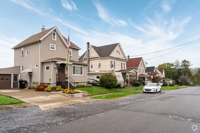 A row of traditional homes sit side-by-side along this street in Porter.