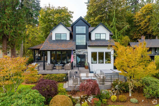A stunning modern cottage-inspired home sits on Lake Geneva in Lakeland South.