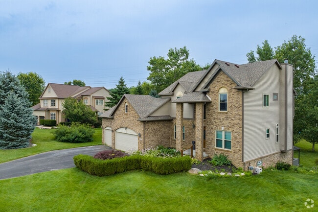 Newly constructed evergreen colonial homes in White Lake are perfect for families.