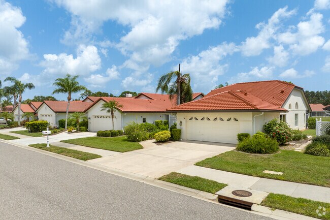 A row of homes with Mediteranean styling in Venice East neighborhood.