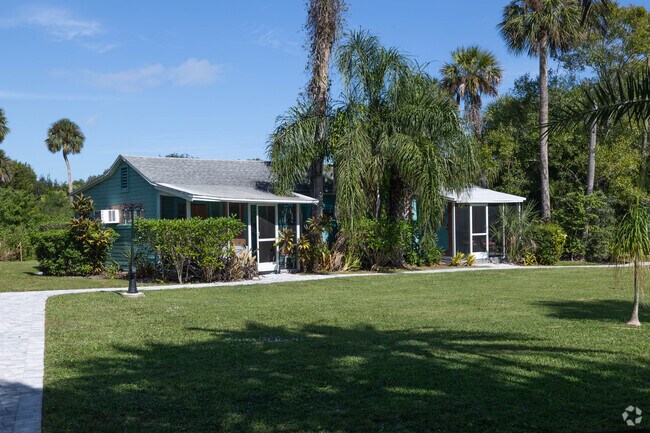 Cottages with small screened in porches protect Saint Lucie Village residents from the heat.