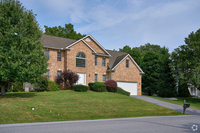 Find a beautiful brick Colonial style home in Robinwood.