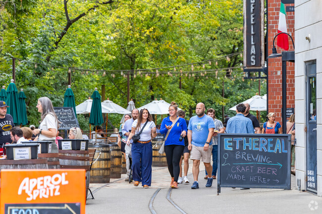 Greendale residents visit bars and restaurants on sunny days at the Distillery District.
