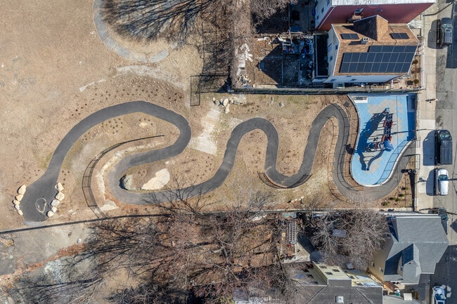 A new playground and serpentine path in Cochran Park have been part of Nodine Hill's recent redevelopment efforts.