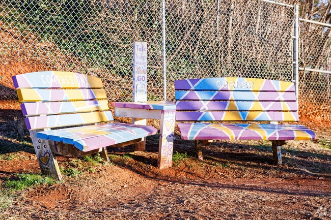 Cook Literacy Model School's playground features a vibrant seating area.