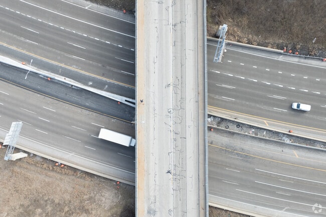 Triangle North residents can safely cross over the freeway using sidewalk lined bridges.