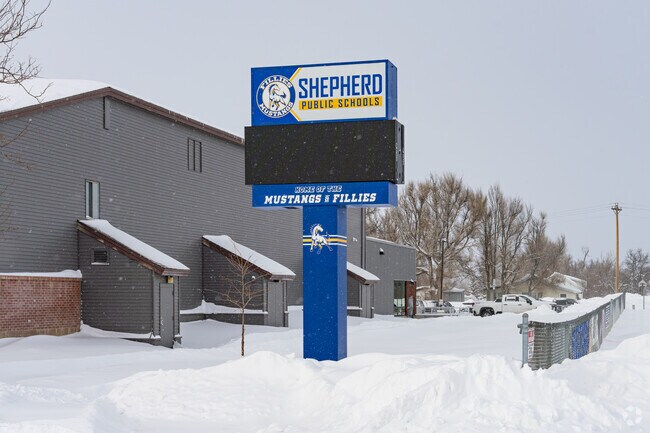 A large marquee outside Shepherd Junior High School informs parents of events.