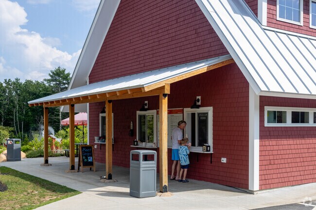 Acton residents enjoy ice cream cones at Wicky Ralph’s after a round of mini golf.